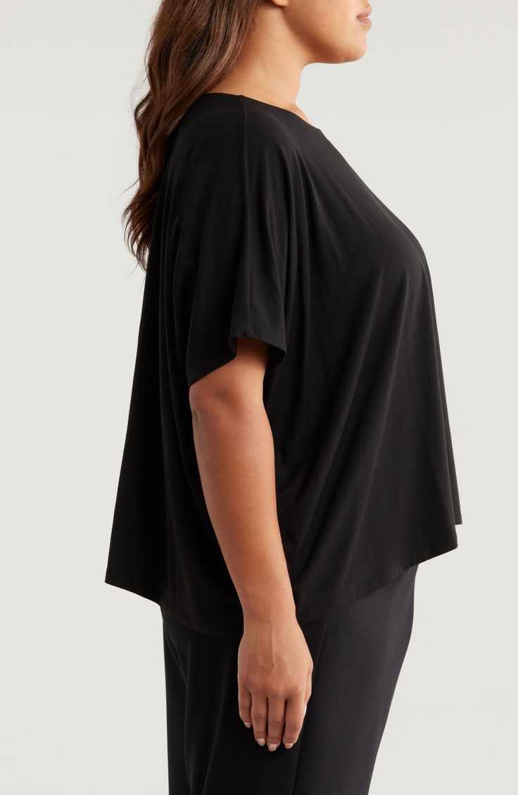 Minimalist ease defines this boxy-fit jersey top that's made from soft, sustainable fibers with plenty of stretch for a casual look on your off-duty days. 25 1/2" length Ballet neck Short sleeves 95% Tencel® lyocell, 5% spandex Tencel lyocell is a more-sustainably produced fiber made with closed-loop processing Machine wash, line dry Imported 4-way Stretch Tops For Everyday, Oversized Versatile Top, Effortless Black Relaxed Fit Tops, Everyday 4-way Stretch Top, Versatile Everyday Tops With 4-way Stretch, Everyday Solid Color 4-way Stretch Tops, Casual V-neck Top With 4-way Stretch, Black Relaxed Fit Top In Modal, Versatile V-neck Tops With 4-way Stretch