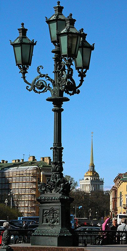 a lamp post in the middle of a city