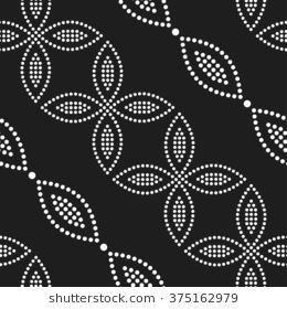 an abstract black and white pattern with circles, dots and lines on a dark background