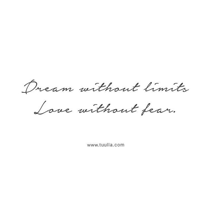 the words dream without limits love without fear are written in black ink on a white background