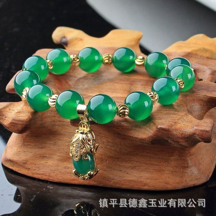 Jade symbol includes associations with nobility and wealth. Many consider it a protector of generations, living and dead. Jade has been and always will be the “Gem Supreme” and the “Jewel of Heaven,” stone of the heart. Main Stone: Jade Fine or Fashion: Fine Spiritual Jade Crystal Bracelet Gift, Spiritual Jade Jewelry With 108 Beads, Spiritual Chalcedony Jewelry For Meditation, Jade Bracelets With Natural Stones For Good Luck, Good Luck Jade Bracelets Spiritual Style, Spiritual Jade Bracelets For Good Luck, Good Luck Bracelets With Natural Jade Stones, Green Agate Bracelets For Gifts, Gold Jade Crystal Bracelet Spiritual Style