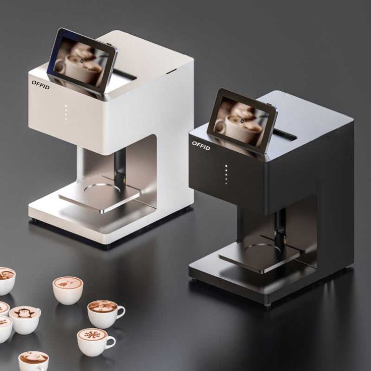 several cups of coffee are sitting in front of an automatic coffee machine with two pictures on the screen