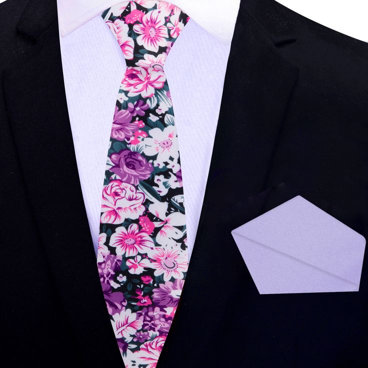 This silk necktie in shades of pink with white and dark green floret patterns blends a touch of whimsy with classic elegance. The soft pink base is beautifully contrasted by the white and dark green floret design, adding a unique visual texture that feels both fresh and sophisticated. This tie is perfect for occasions where a refined yet lively look is desired. Dress Shirts: White Dress Shirt: A white dress shirt highlights the vibrant pink and floret pattern of the tie, creating a crisp and cle Elegant Floral Print Ties As Gift, Elegant Floral Print Ties As A Gift, Elegant Floral Print Ties For Gifts, Elegant Floral Print Accessories For Black Tie, Elegant Multicolor Floral Print Suit And Tie Accessories, Elegant Floral Print Ties For Spring, White Floral Print Tie For Formal Occasions, Formal White Suit And Tie Accessories With Floral Print, Formal White Floral Print Suit And Tie Accessories