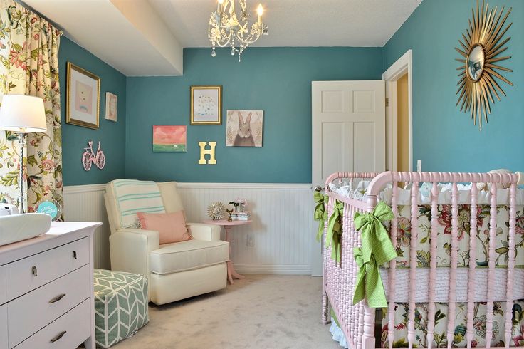 a baby's room with blue walls and pink furniture in the center is featured on instagram