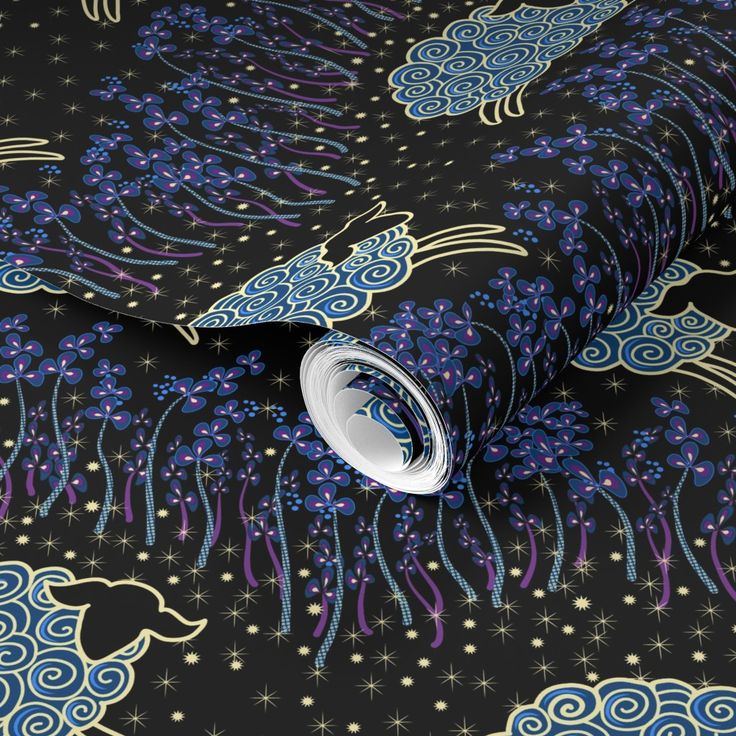 a black background with blue and purple designs on it