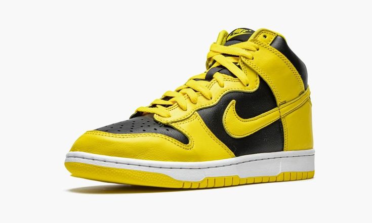 The Nike Dunk High SP “Varsity Maize” is an original colorway from Nike’s “Be True to Your School Pack” in 1985 that was designed for the Iowa Hawkeyes basketball team.  Also known as the “Goldenrod” colorway, the predominantly two-tone black-and-yellow design was once used on a limited edition Wu-Tang Dunk way back in 1999, as well.  Unlike the prior “Varsity Maize” releases, the Wu-Tang design displayed the hip-hop group's “W” logo embroidered on the heel.  As for this shoe, Nike reissued the Style Nike Dunk High, Iowa Hawkeyes Basketball, First University, Nike Sb Dunk High, School Pack, Sb Dunk High, Yellow Nikes, Yellow Design, W Logo