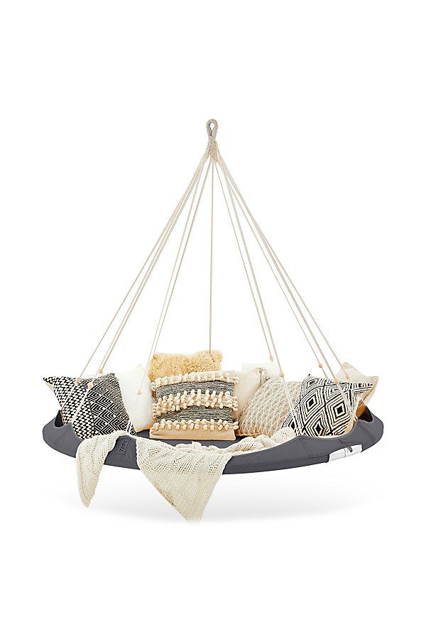 a hammock with pillows hanging from it's sides and on the back