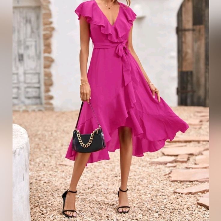 New Chic Ruffle Wrap Tie Midi Dress * Wrap Deep V Neckline * Ruffle Trim * High Waist * Belted Tie Waist * A Line Flare High Low Skirt * Ruffle Hem * Short Flutter Sleeve * Side Zip *Approximate Unstretched Measurements* Small (4) * Bust 35.25" * Waist 28.5" * Length 47" Medium (6) * Bust 37" * Waist 30" * Length 47.5" Large (8/10) * Bust 39.25" * Waist 32.5" * Length 48.25" Xl (12) * Bust 41.5" * Waist 35" * Length 49" *On Order* Will Ship In 7-10 Days * Fabric : Soft Flowy Poly Color : Hot Pin Casual Short Sleeve Dress, Office Dresses For Women, New Chic, Office Dresses, Party Dresses For Women, Flowing Maxi Dress, Glamorous Evening Gowns, Beach Dress, Women's Fashion Dresses