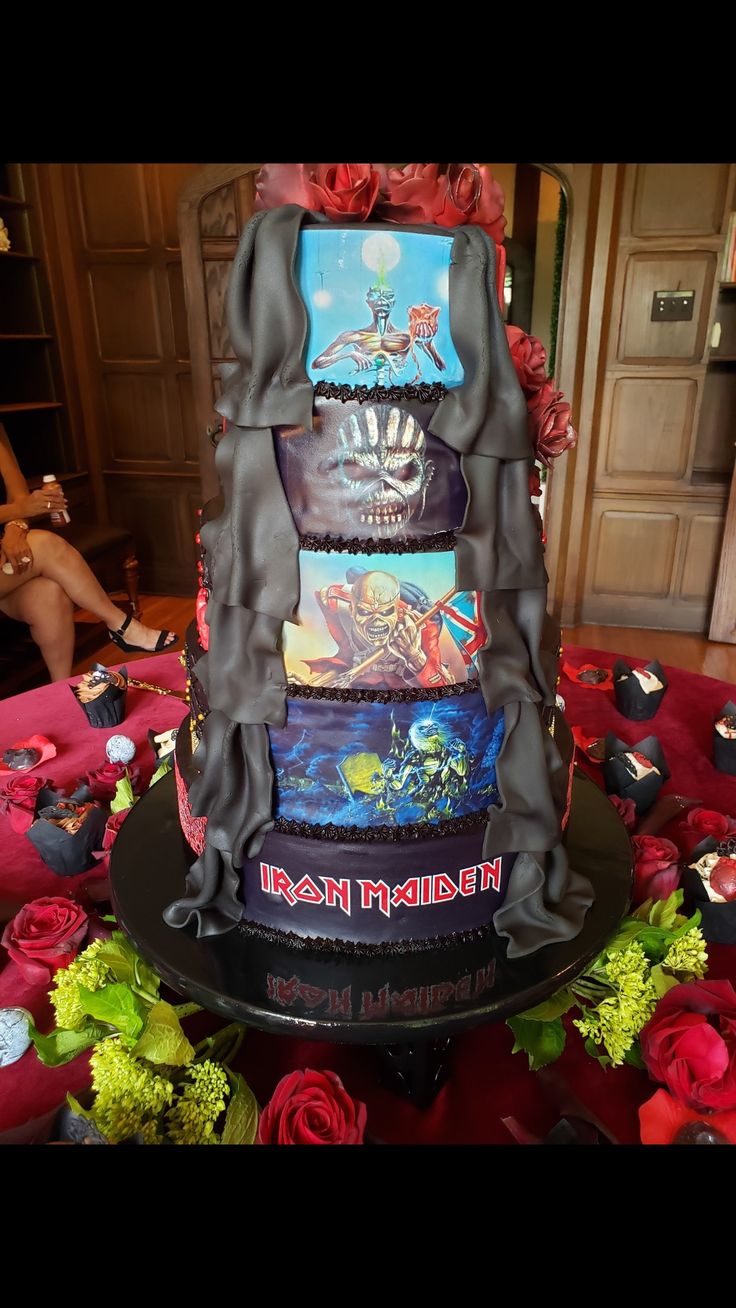 the cake is made to look like it has been decorated with images of movies on it