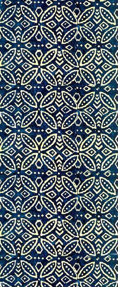 a blue and white background with an intricate design