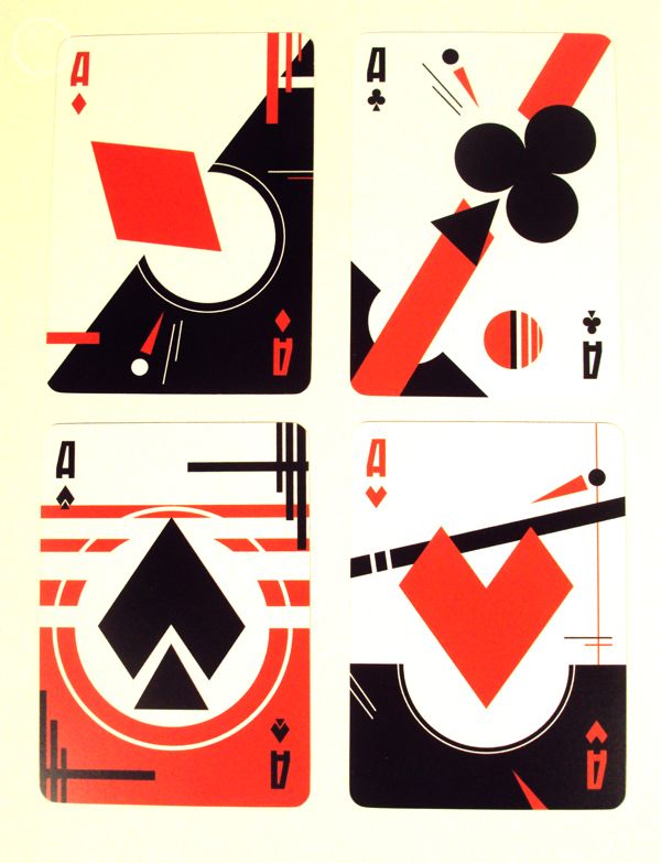 four playing cards with black and red designs