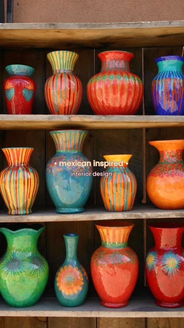 many different colored vases are on display