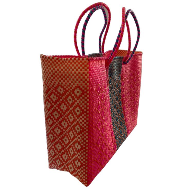 Oaxaca tote Bag, Handmade Mexican Bag, Getaways bag, Travel Bag, Basket, Beach Bag,vegan bag ,Plastic Woven, Oaxaca Bag, recycled plasticThe specifics are impressive: the bag is woven from a heavy duty, pliable plastic that is near indestructible. The weave is so tight, the bag is waterproof, which alone makes it uniqueApproximate measurements.13.5 h x 17 w x 5.5 d34 x 43 cmPlease note, since this piece is made by hand there may be some imperfections. Instead of viewing this as a mistake, let it Red Handwoven Rectangular Straw Bag, Rectangular Red Straw Bag For Shopping, Red Rectangular Straw Bag For Daily Use, Red Rectangular Straw Bag For Shopping, Rectangular Red Straw Shopping Bag, Red Rectangular Straw Shopping Bag, Eco-friendly Red Tote Bag, Eco-friendly Woven Shopping Bag, Red Handwoven Tote Bag