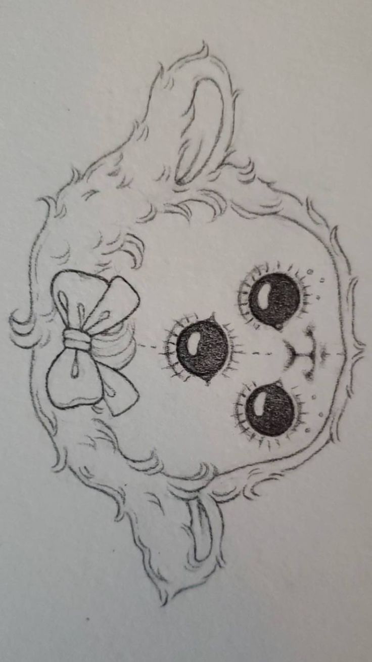 a drawing of a teddy bear with big eyes and a bow on its head is shown