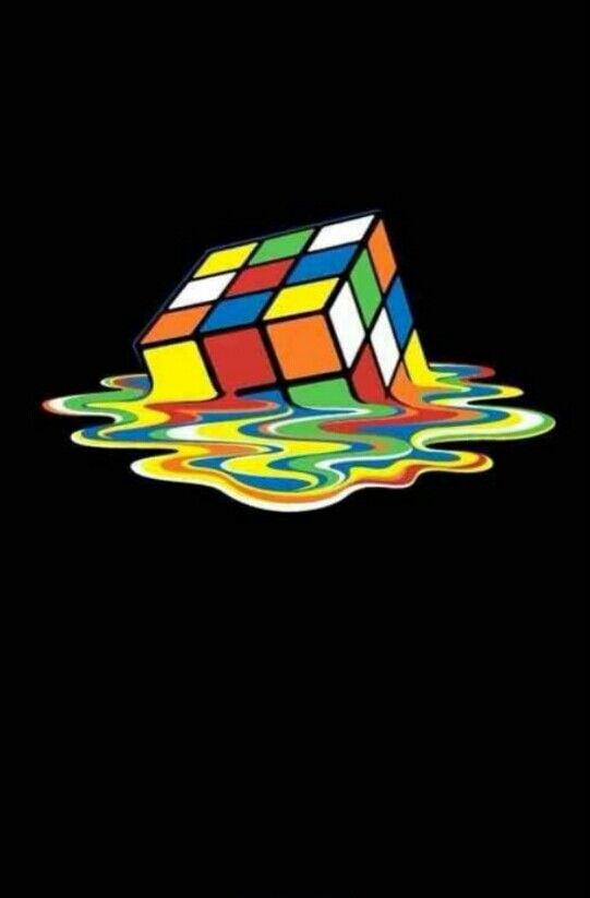 an image of a rubik cube floating in the water with liquid coming out of it