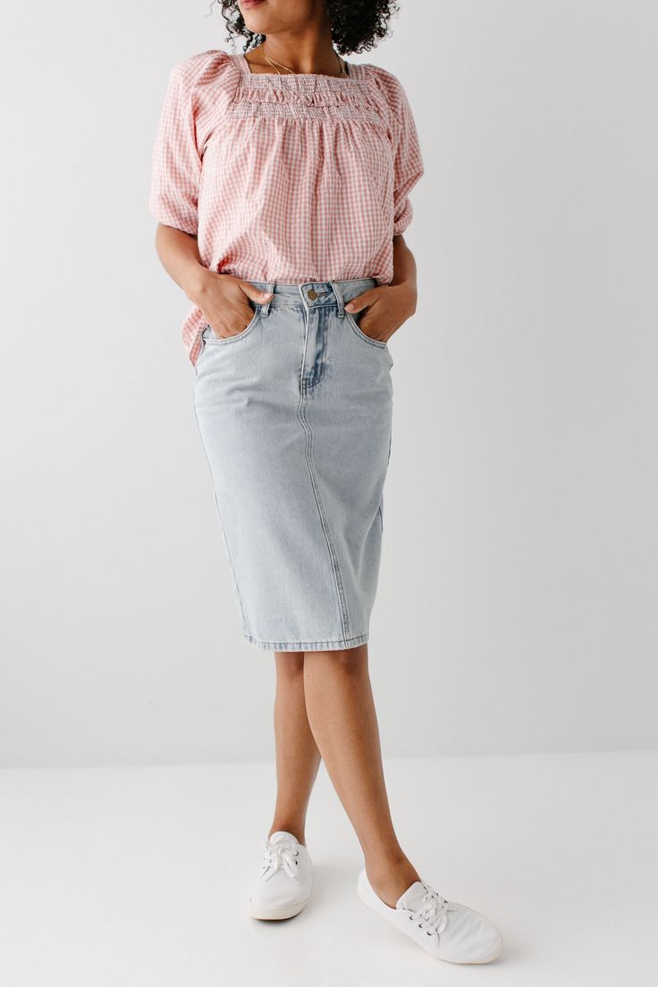 The 'Kyra' is another one of our very own exclusive denim skirts. Designed with everyday wear in mind, this skirt will pair well with just about any casual top in your wardrobe! This denim skirt is 100% cotton and does not have stretch, giving it a vintage vibe we love! Every woman needs a classic, straight denim skirt in her closet and this skirt is an excellent choice! Available in light or vintage wash. 100% Cotton Machine Wash Cold Gentle Cycle Do Not Bleach Hang to Dry Do Not Dry Clean Mode Spring Relaxed Denim Skirt, Cotton Summer Skirt Jeans, Relaxed Fit Cotton Midi Denim Skirt, Casual Medium Wash Denim Midi Skirt, Spring Relaxed Straight Leg Skirt, Spring Knee-length Lined Denim Skirt, Spring Medium Wash Denim Midi Skirt, Spring Relaxed Fit Denim Skirt, Medium Wash Relaxed Fit Cotton Skirt