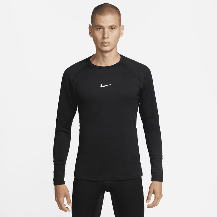 There's no need to dread your workout when the cold weather hits thanks to the Nike Pro Warm collection. This long-sleeve crew is made with soft and stretchy French terry and breathable panels to help you stay comfortable during your favorite sports and activities. Nike Dri-FIT technology moves sweat away from your skin for quicker evaporation, helping you stay dry and comfortable. A round hem offers security when you tuck the shirt in and gives you more coverage when it's left untucked. Nike World, White Hoodie Men, Running Hoodie, Nike Pullover, Team Wear, Nike Sweatshirts, Blue Nike, Nike Tees, Mens Sportswear