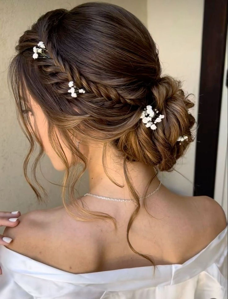 a woman with long hair and flowers in her hair is wearing a white dress, looking down