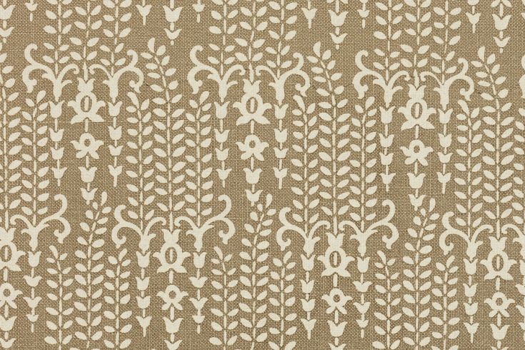 a brown and white fabric with small leaves on the side, which is very similar to an ornamental pattern