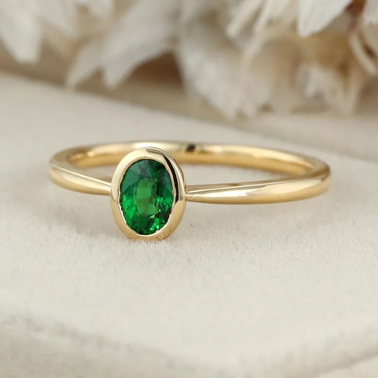 Enchant the senses with our exquisite 14k Yellow Gold Oval Cut Green Tsavorite Ring for Women. Radiating natural beauty, this captivating ring boasts a luscious green tsavorite gemstone delicately set in luxurious yellow gold. Oval Tsavorite Ring With Bezel Setting, Green Tsavorite Birthstone Ring, Tsavorite Ring, Bezel Ring, The Senses, Affordable Jewelry, Ring For Women, Lab Diamonds, Gold Style