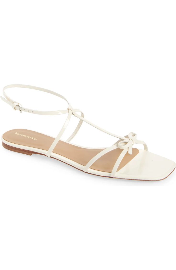 Reformation Maya Bow Sandal (Women) | Nordstrom Elegant T-strap Sandals With Buckle Closure For Spring, Spring T-strap Sandals With Adjustable Strap, Spring Adjustable Cross Strap Slingback Sandals, Chic Sandals With Heel Strap And Toe Loop, Chic Strappy T-strap Sandals With Adjustable Strap, Elegant Spring Lace-up Sandals With Removable Insole, Elegant Spring T-strap Sandals With Adjustable Strap, Spring T-strap Slingback Sandals With Adjustable Strap, Elegant T-strap Sandals With Adjustable Strap For Spring