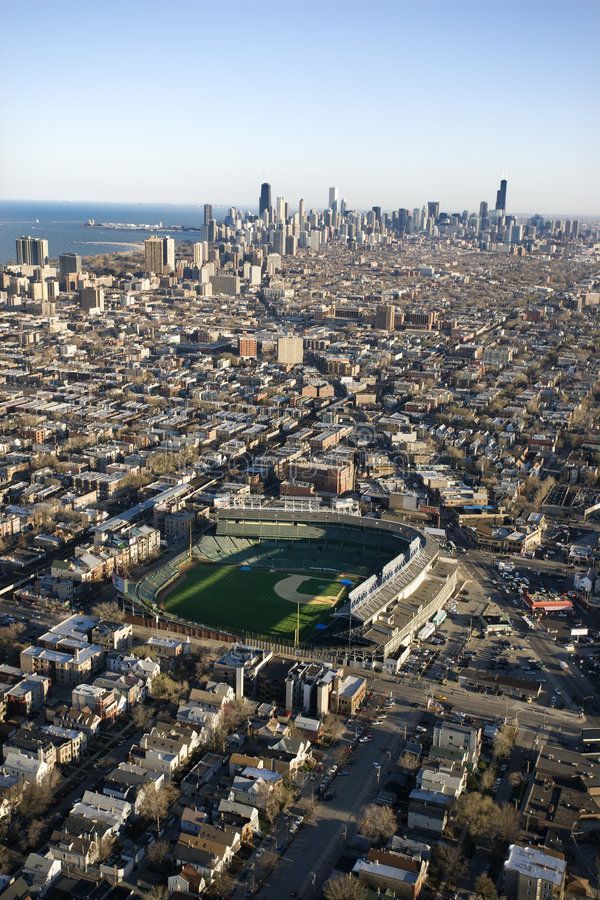 an aerial view of a baseball stadium in the city