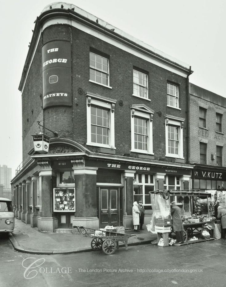 an old black and white photo of people standing in front of a store on the corner