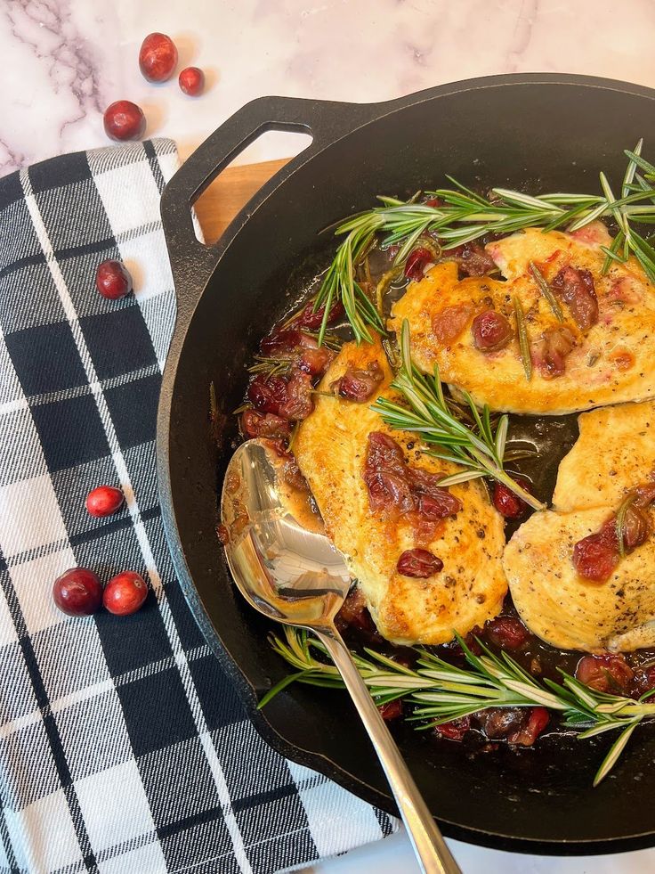 some food is cooking in a pan on the table