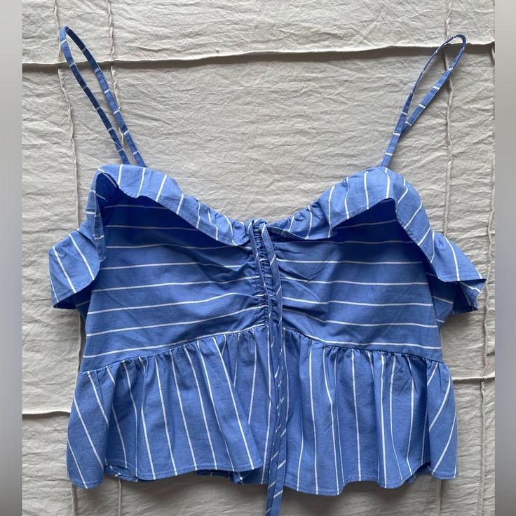 - Express Tank Top - Smocked Back - Ties In Front - Blue And White Striped - Cropped - Size Small - New Condition, Never Worn Summer Cotton Tops With Drawstring, Cotton Beach Tops With Drawstring, Striped Ruffle Tops For Beach, Striped Ruffled Tops For Beach, Striped Ruffled Tops For The Beach, Summer Tops With Drawstring For Day Out, Summer Drawstring Tops For Day Out, Cotton Tops With Smocked Bodice For Beach, Cotton Top With Smocked Bodice For Beach