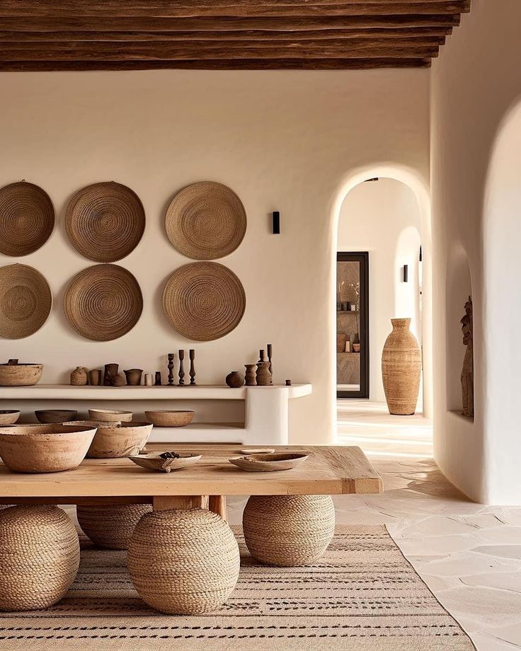 a dining room with plates and bowls on the wall