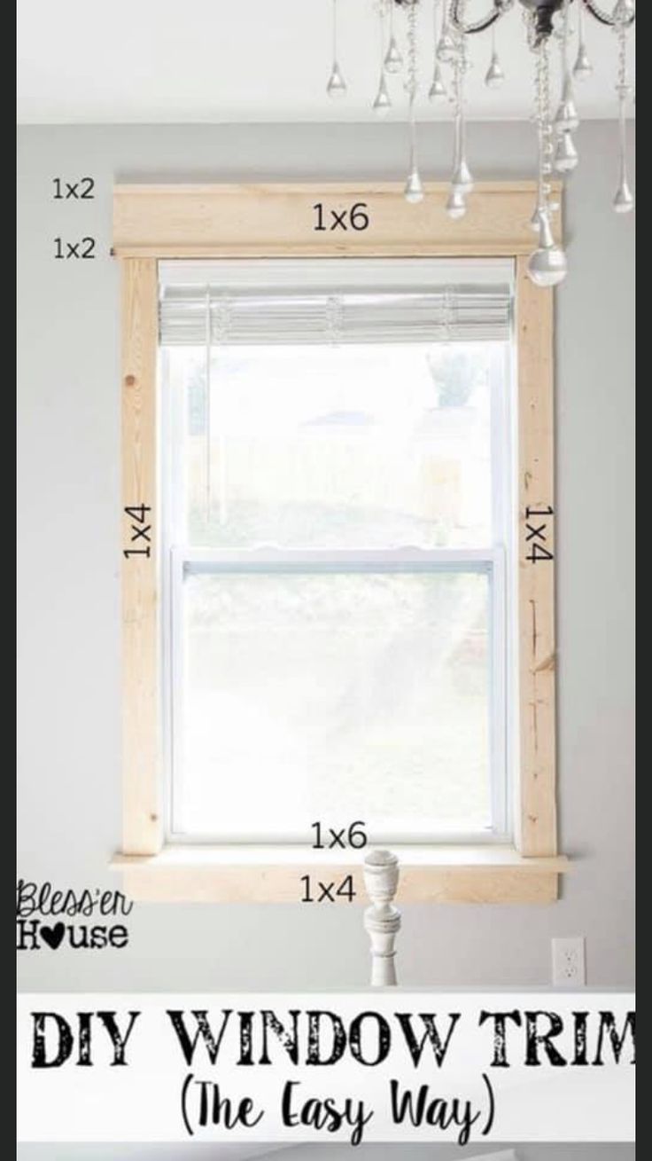 a window frame with measurements for the top and bottom half of it, in front of a