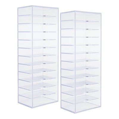 two clear shelvings with drawers on each side