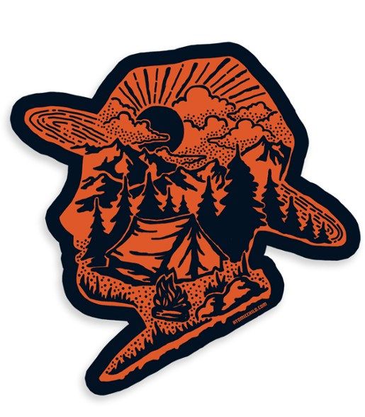 an orange and black sticker with the image of a person camping