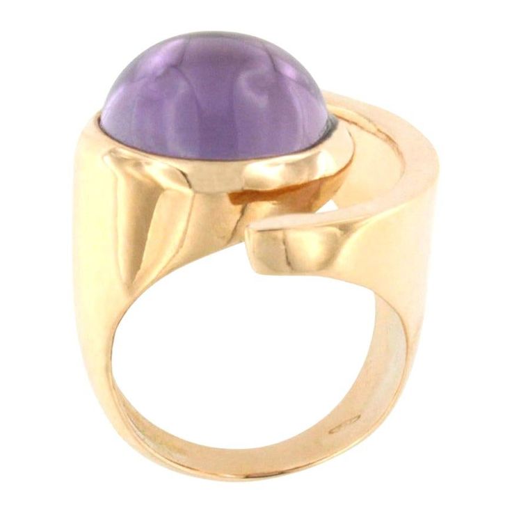 Ring in rose gold 18 Karat with Amethyst cabochon round cut (size: 14 mm). This modern ring is part of the new collection "Smooth" and takes inspiration from modern shape. The design is very accurate and unique. Our mission is to combine colorful stones and unique shape and design. Size of ring: EU 14 - USA 7 All Stanoppi Jewelry is new and has never been previously owned or worn. Each item will arrive at your door beautifully gift wrapped in Stanoppi boxes, put inside an elegant pouch or jewel Elegant Pouch, Gold Amethyst Ring, Colorful Stones, Amethyst Gold, Bracelet Design, Modern Ring, Bling Rings, Women Diamond, Ring Ring