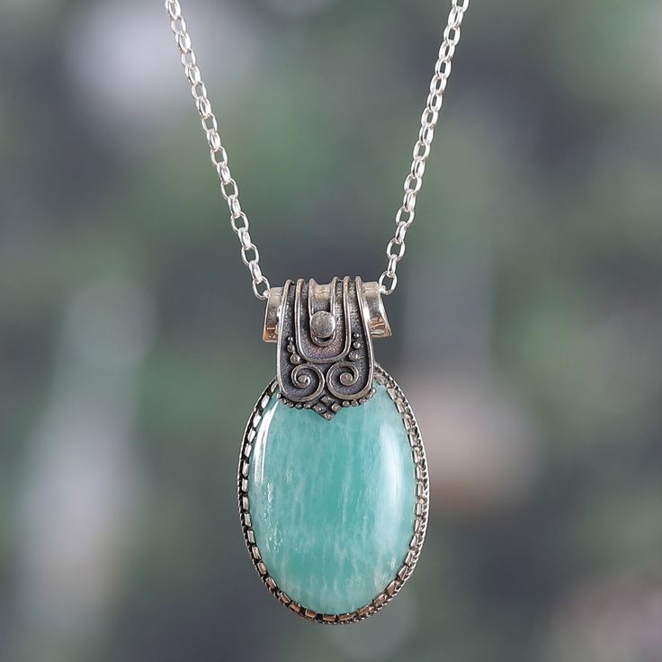 The royal ornaments of the classic Indian palaces rest now in this glorious creation by local artisans. Presented by Alok Jain, this sterling silver pendant necklace features a combination of polished and oxidized finishes that enhance each of the traditional motifs ornamenting the piece—also crowned with an amazonite cabochon to represent your marine soul. Indian Palaces, Vintage Jewelry Ideas, India Gift, Traditional Motifs, Cabochon Jewelry, Citrine Stone, Cabochon Pendant, Green Peridot, Sterling Silver Necklace Pendants