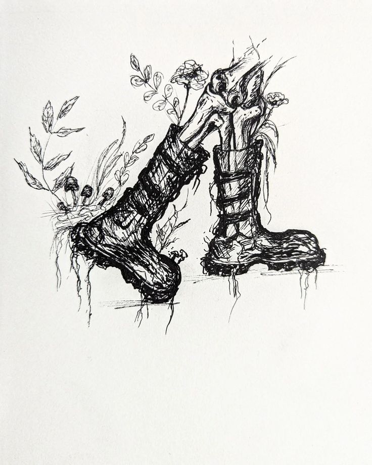 a black and white drawing of a pair of boots sitting on top of a table