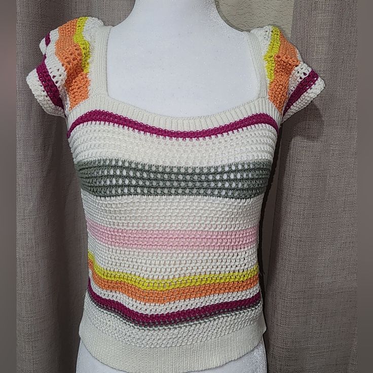 Super Cute Cream-Colored Sweater With Green, Yellow, Orange, Pink, And Fuchsia Stripes. 100% Cotton. Brand New Without Tags. Size Medium 10/12 Striped Knitted Cotton Top, Playful Knitted Crew Neck Top, Cute White Knit Top, Playful Knitted Tops For Spring, White Knit Playful Tops, Playful White Knitted Top, White Playful Knit Top, Playful White Knit Top, Casual White Knitted Top