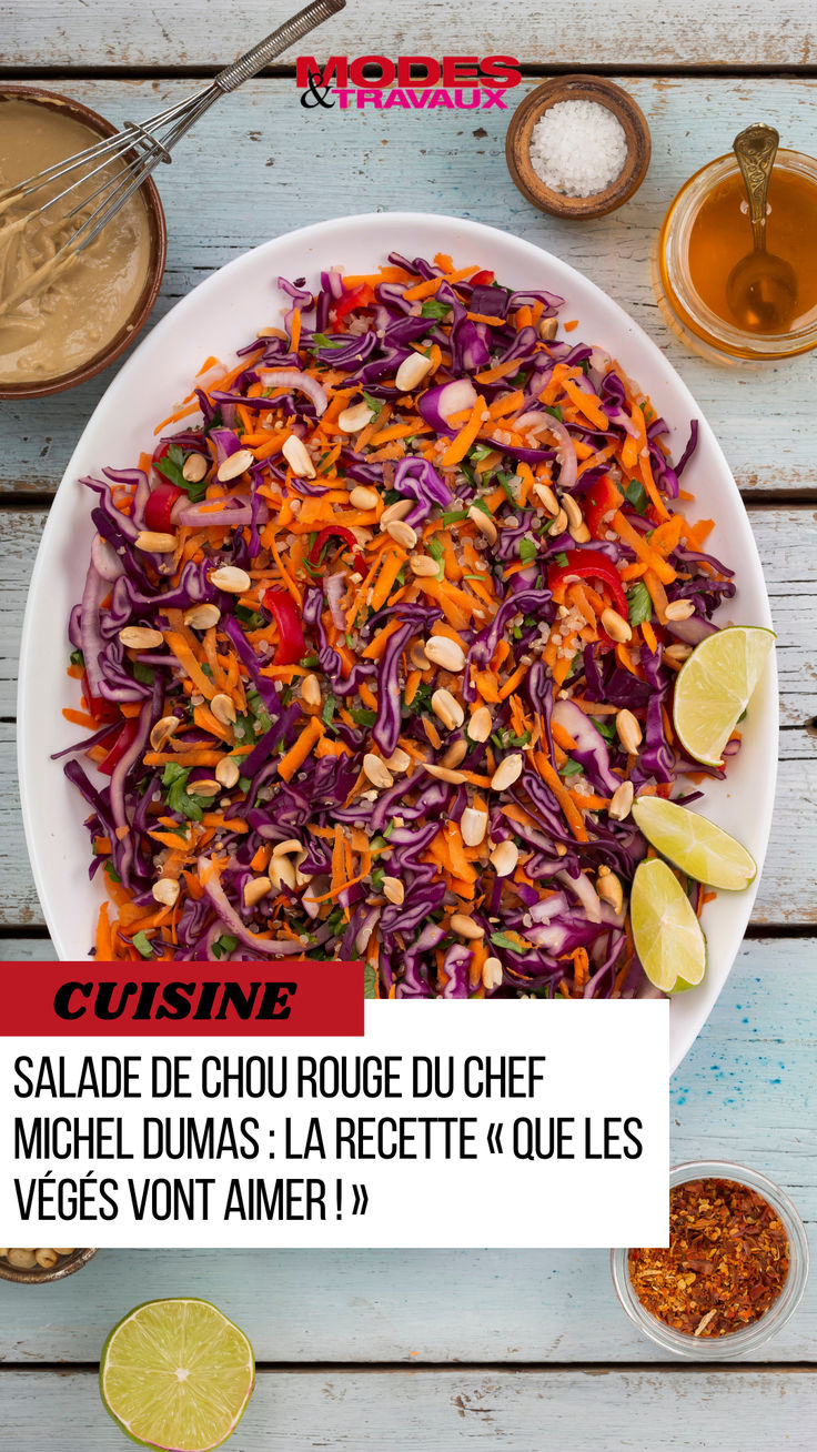 a bowl filled with coleslaw, carrots and other ingredients on top of a table