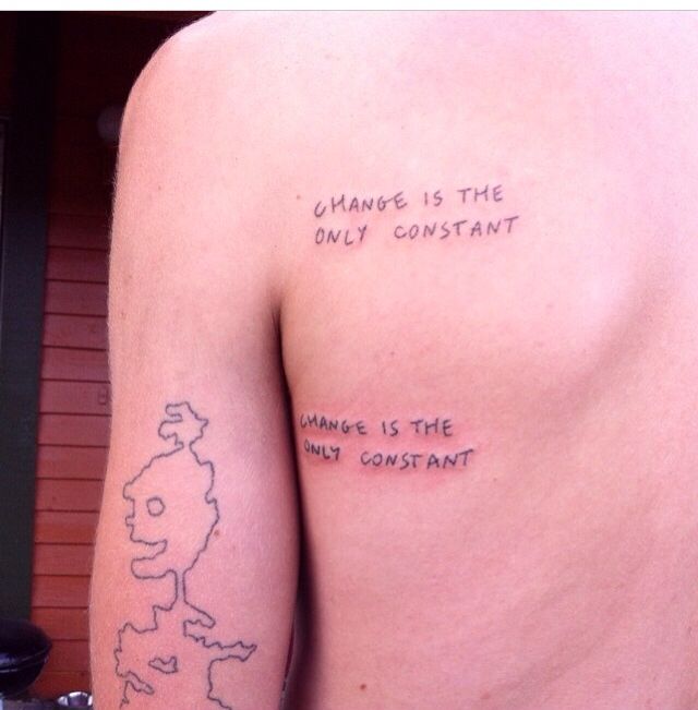 the back of a man's shoulder with a quote on it that says change is the only constant