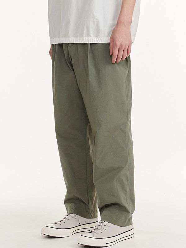 Casual Olive Wide-leg Pants, Khaki Parachute Pants With Relaxed Straight Leg Fit, Relaxed Fit Cargo Pants With Welt Pockets For Streetwear, Khaki Wide-leg Parachute Pants With Side Pockets, Olive Relaxed Fit Pants, Olive Relaxed Fit Trousers, Khaki Parachute Pants For Work, Baggy Khaki Parachute Pants Ankle-length, Utility Style Olive Relaxed Fit Pants