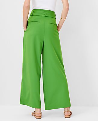 Elevate your wardrobe with the Ann Taylor Tall Tie Waist Wide Ankle Pant, a blend of sophistication and comfort. This piece is a standout with its wide leg design and high-rise fit that flatters any figure. 

- **Size:** 2 Regular
- **Color:** Matcha
- **Material:** 73% Polyester, 20% Rayon, 7% Spandex
- **Gender:** Female
- **Fit:** Relaxed and easy
- **Length:** Hits at ankle, 30 1/2" inseam with a 27" leg opening
- **Features:** Front zip with double hook-and-bar closure, belt loops, self-tie Belted Wide Leg Pants For Spring, Spring Solid Color Belted Wide Leg Pants, Trendy Belted Wide Leg Pants For Spring, Formal Belted Bottoms For Spring, Spring Formal Belted Bottoms, Spring Workwear Bottoms With Tie Waist, Versatile Spring Wide Leg Pants With Belt Loops, Versatile Wide Leg Pants With Belt Loops For Spring, Trendy Spring Workwear Culottes