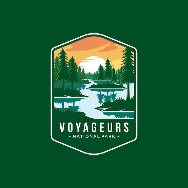 the logo for voyageurs national park, which features a river and trees