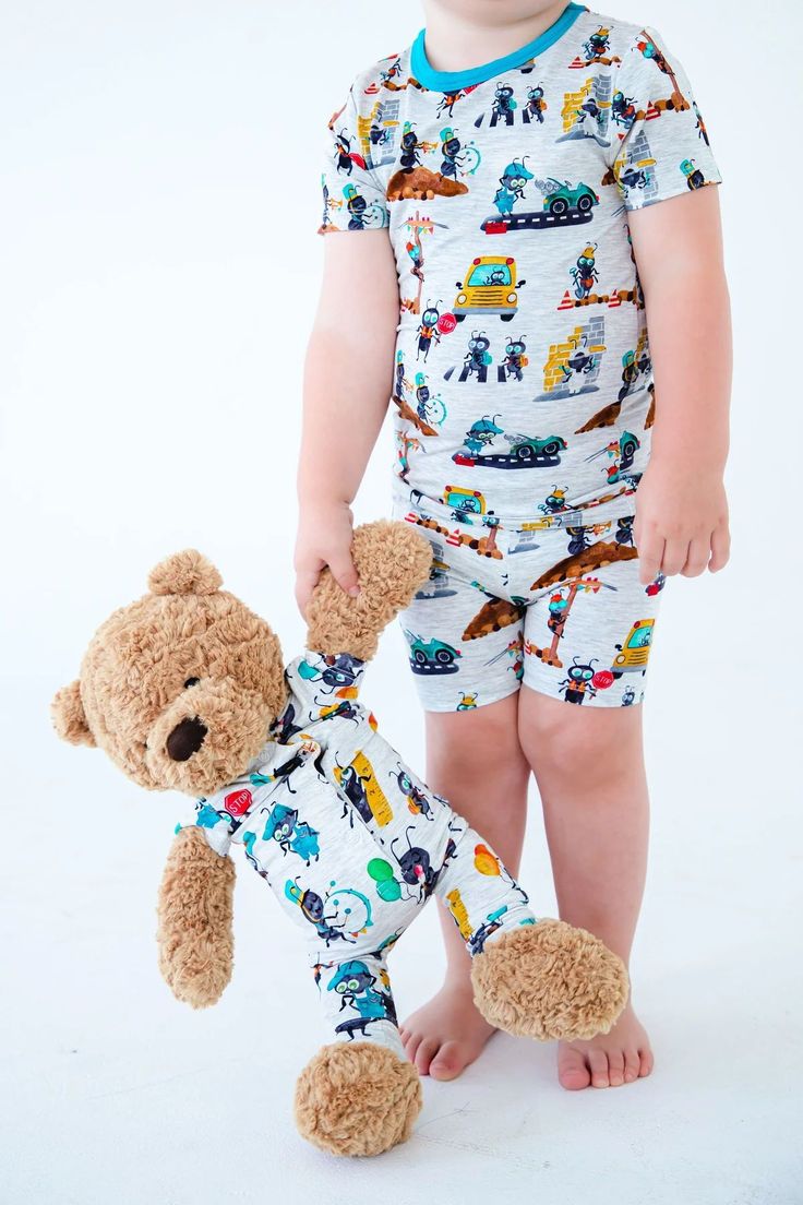 Nothing is cuter than when your little one's doll or stuffed toy is dressed in a matching outfit! These rompers are incredibly charming and crafted with the same wonderful fabric you've come to know and love. [doll and teddy bear outfits, small teddy bear clothes, doll and teddy bear show, teddy bear clothes and accessories, baby doll teddy bear, best friend teddy bear] Playful Short Sleeve Onesie, Playful Short Sleeve Bubble Romper For Playdate, Cute Bubble Romper With Short Sleeves For Loungewear, Cute Short Sleeve Bubble Romper For Loungewear, Cute Short Sleeve Bubble Romper For Playdate, Playful Fitted Onesie For Bedtime, Playful Cartoon Print Onesie For Sleepovers, Fun Short Sleeve Onesie For Playtime, Cute Short Sleeve Jumpsuits And Rompers For Playtime