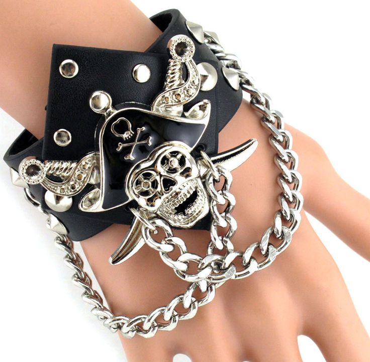 CindyDo you want to add a punk rock accessory to your biker collection that will turn heads everywhere you go? If so, these Badass Rockstar Bracelets w/ Metal Spikes are everything you’re looking for, and more. Made of high-quality PU leather and sturdy alloy, these Badass Rockstar Bracelets w/ Metal Spikes are extremely durable and comfortably fit on your wrist. Because of the quality of the materials, these Badass Rockstar Bracelets w/ Metal Spikes will keep their good shape for a very long ti Silver Rivets Wristband For Concert, Black Rocker Bracelets With Rivets, Black Rivet Rocker Bracelets, Edgy Black Metal Wristband, Punk Style Black Wristband For Festivals, Black Riveted Bracelets For Concerts, Black Rock Wristband For Concerts, Black Rock Style Wristband For Concerts, Trendy Black Bracelets With Rivets