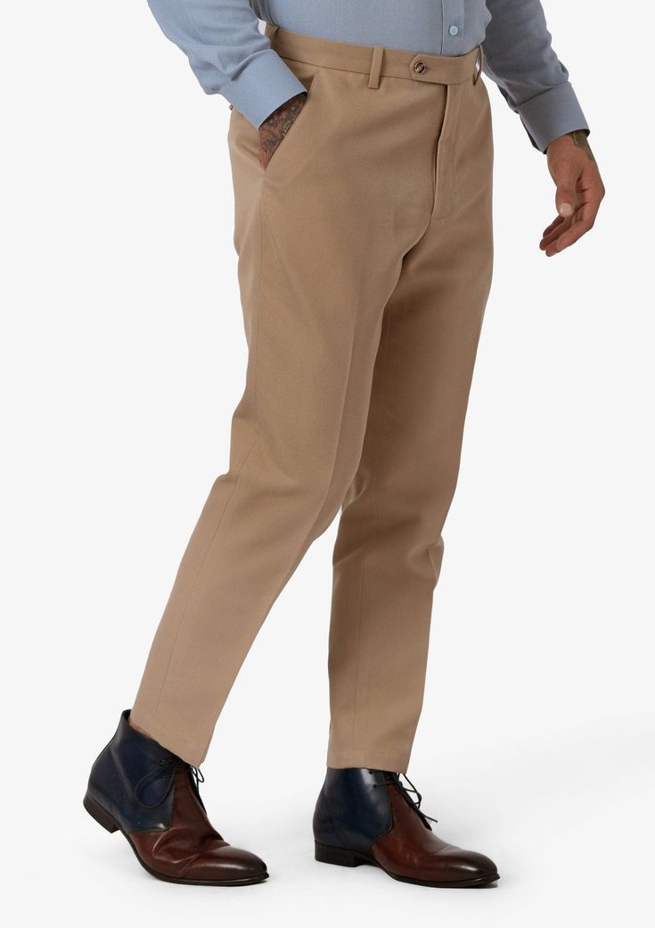 Our Camel Cotton Chino Pants are a classic wardrobe staple. Made of durable, high-quality cotton, these pants stand the test of time and are great for both casual and professional occasions and a consistent best seller. Chino Cotton Twill Ankle Pants For Work, Chino Cotton Twill Ankle-length Work Pants, Brown Chino Cotton Twill Bottoms With Welt Pockets, Business Casual Brown Straight Leg Chinos, Cotton Dress Pants With Tapered Leg For Work, Ankle-length Chino Cotton Twill Chinos For Work, Ankle-length Chinos For Workwear, Classic Brown Chino Cotton Twill Bottoms, Cotton Tapered Leg Dress Pants For Work