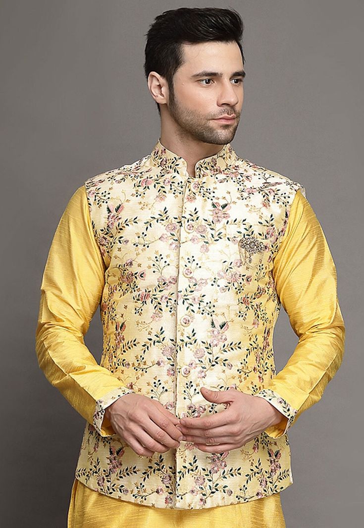 Art Silk Nehru Jacket in CreamThis Readymade Sleeveless attire is Enhanced with Buttons, Resham and Zari Work. Crafted in Chinese Collar NeckDo note: Brooch and Kurta shown in the image is for presentation purposes only. Half to one inch may vary in measurement. (Slight variation in actual color vs. image is possible) We sell all kinds of menswear. Mens Kurta | Mens Kurta Pajama | Mens Sherwani | Mens Sherwani Sets | Traditional Menswear | Partywear Menswear | Indian Mens Dresses | Diwali Kurta Spring Chanderi Nehru Jacket With Resham Embroidery, Spring Resham Embroidery Chanderi Nehru Jacket, Spring Nehru Jacket With Resham Embroidery In Chanderi, Designer Sleeveless Embroidered Nehru Jacket, Sleeveless Embroidered Nehru Jacket For Designer Wear, Sleeveless Nehru Jacket With Resham Embroidery For Eid, Sleeveless Nehru Jacket With Zari Work For Transitional Season, Spring Wedding Chanderi Bandhgala, Spring Wedding Bandhgala In Chanderi