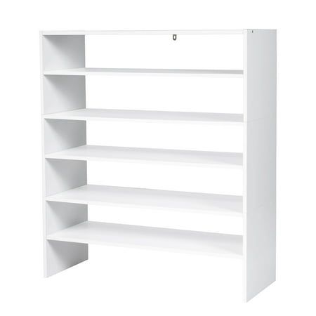 a white book shelf with four shelves on each side