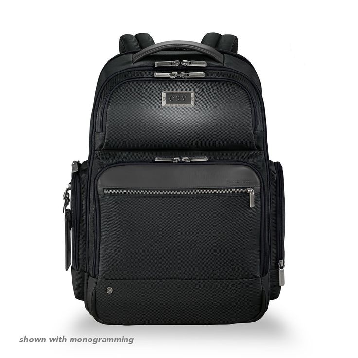 a black backpack with wheels and zippers on the front, sitting against a white background