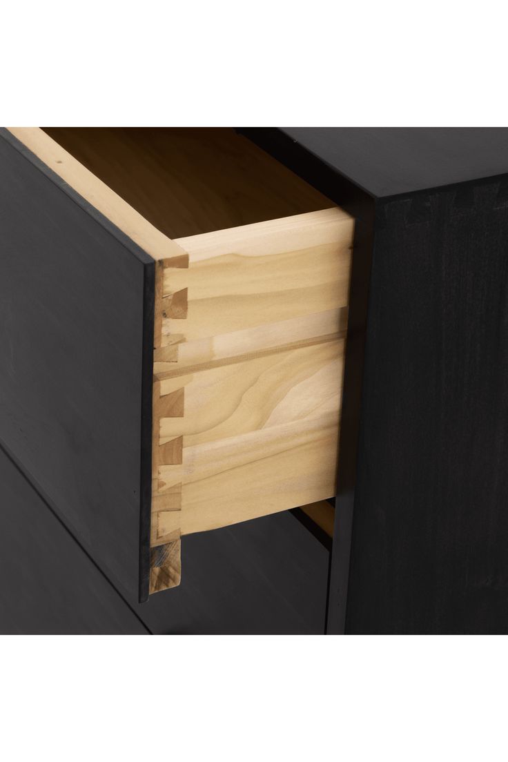 a close up of a drawer with wood handles and drawers on the bottom, as well as an opening to another drawer