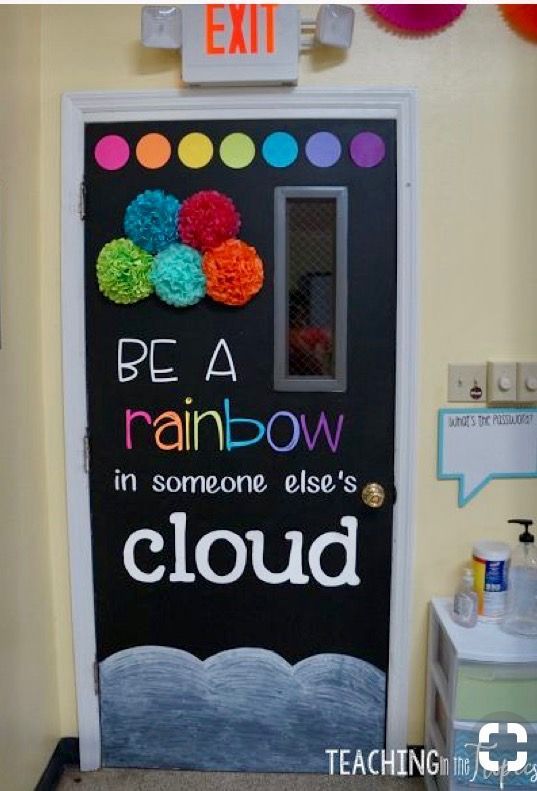 a classroom door decorated with the words be a rainbow in someone else's cloud